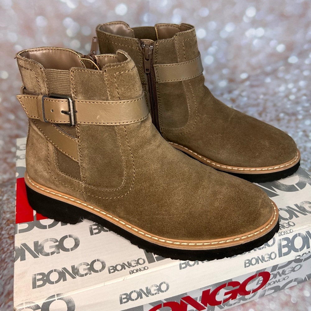 Tan booties, black cushion sole.